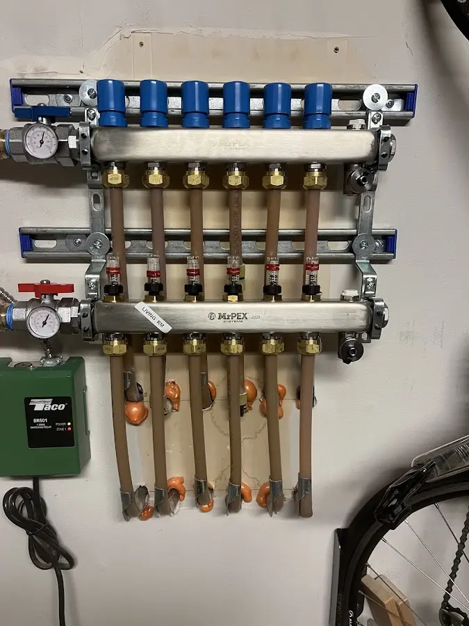 Plumber performing Water Heater Repair at a residential property in Rose Hill